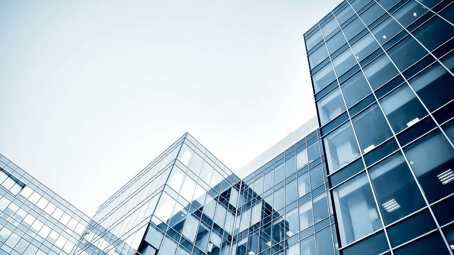 Low angle image of modern business centre in the evening